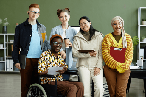 A group of diverse students smiling for the camera.